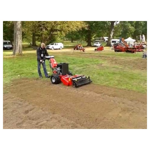 Porte outils 23 cv équipé d'un préparateur de sols Porte outils 23 cv équipé d'un préparateur de sols